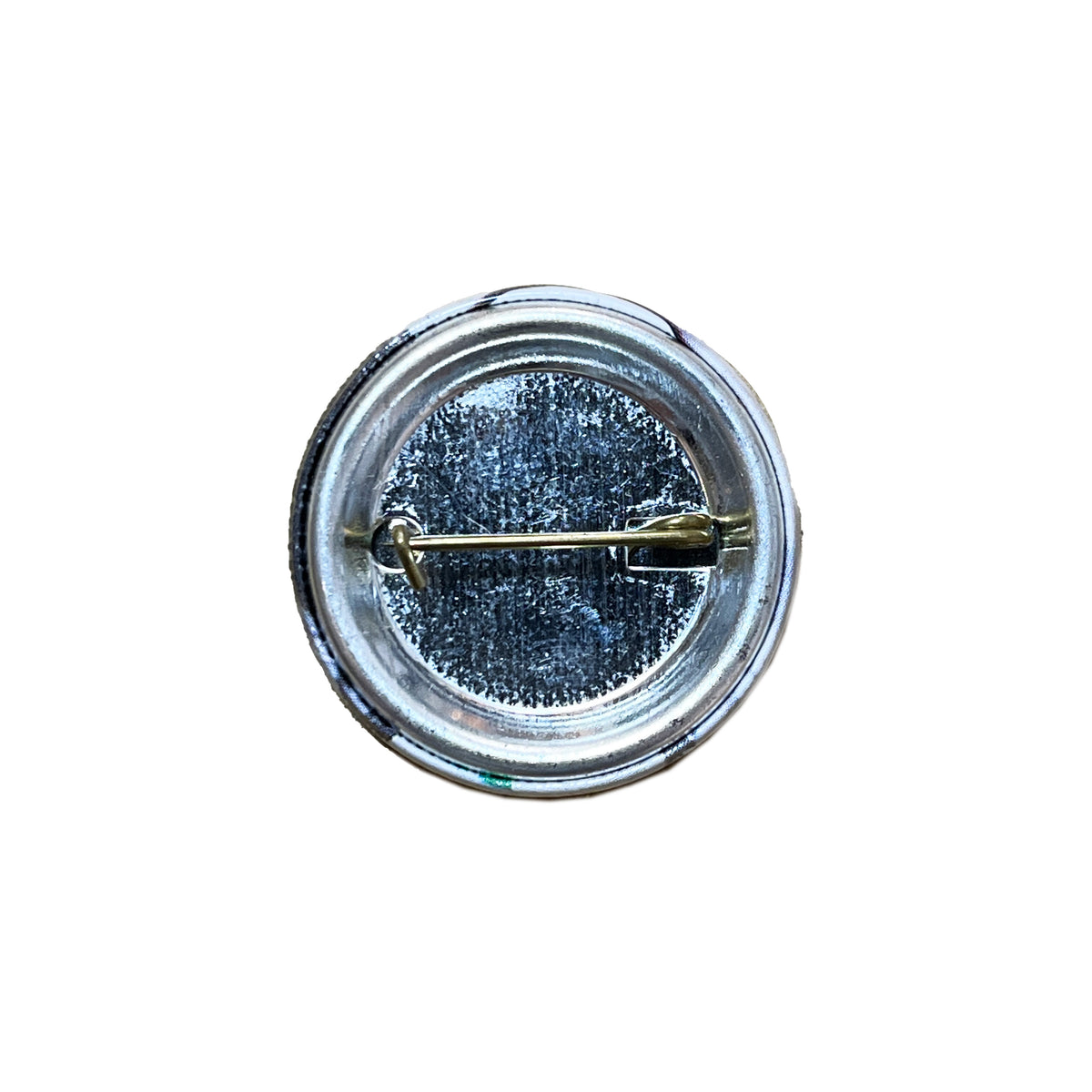 The Clash "London Calling" Badge 背面 金属製のピンバックと 裏地が銀色で光沢のあるデザイン
