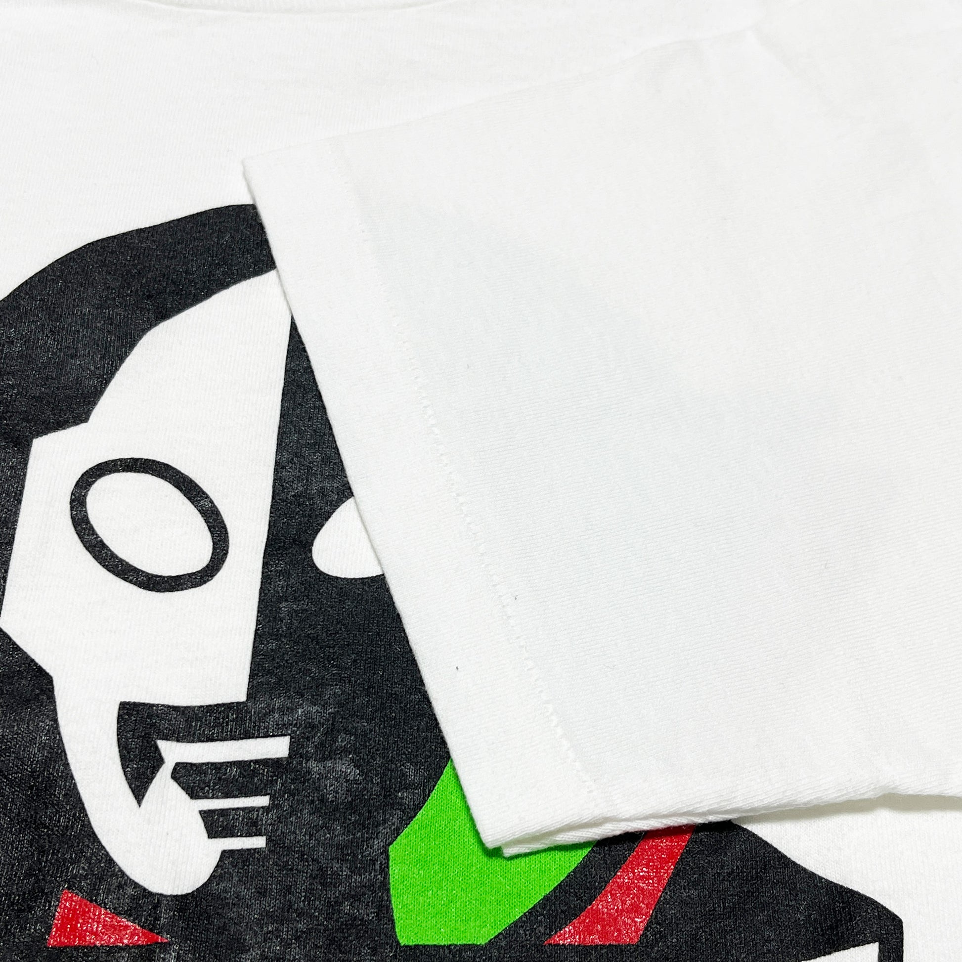90s Allsport ULTRAMAN T L ディテール ULTRAMANロゴの顔の下半分 黒・白・緑の配色