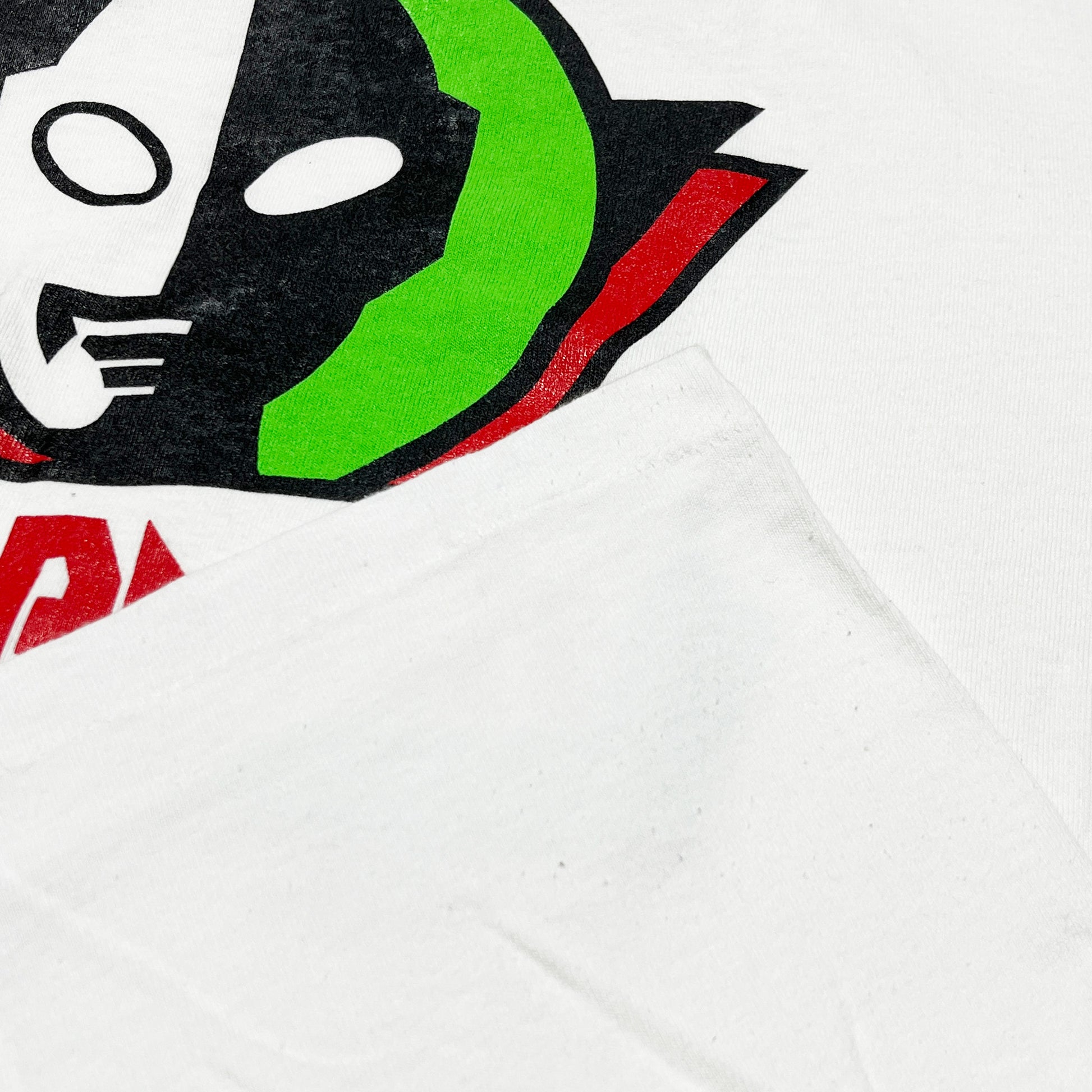 90s Allsport ULTRAMAN T L ディテール ULTRAMANロゴの顔の上半分 黒・白の配色