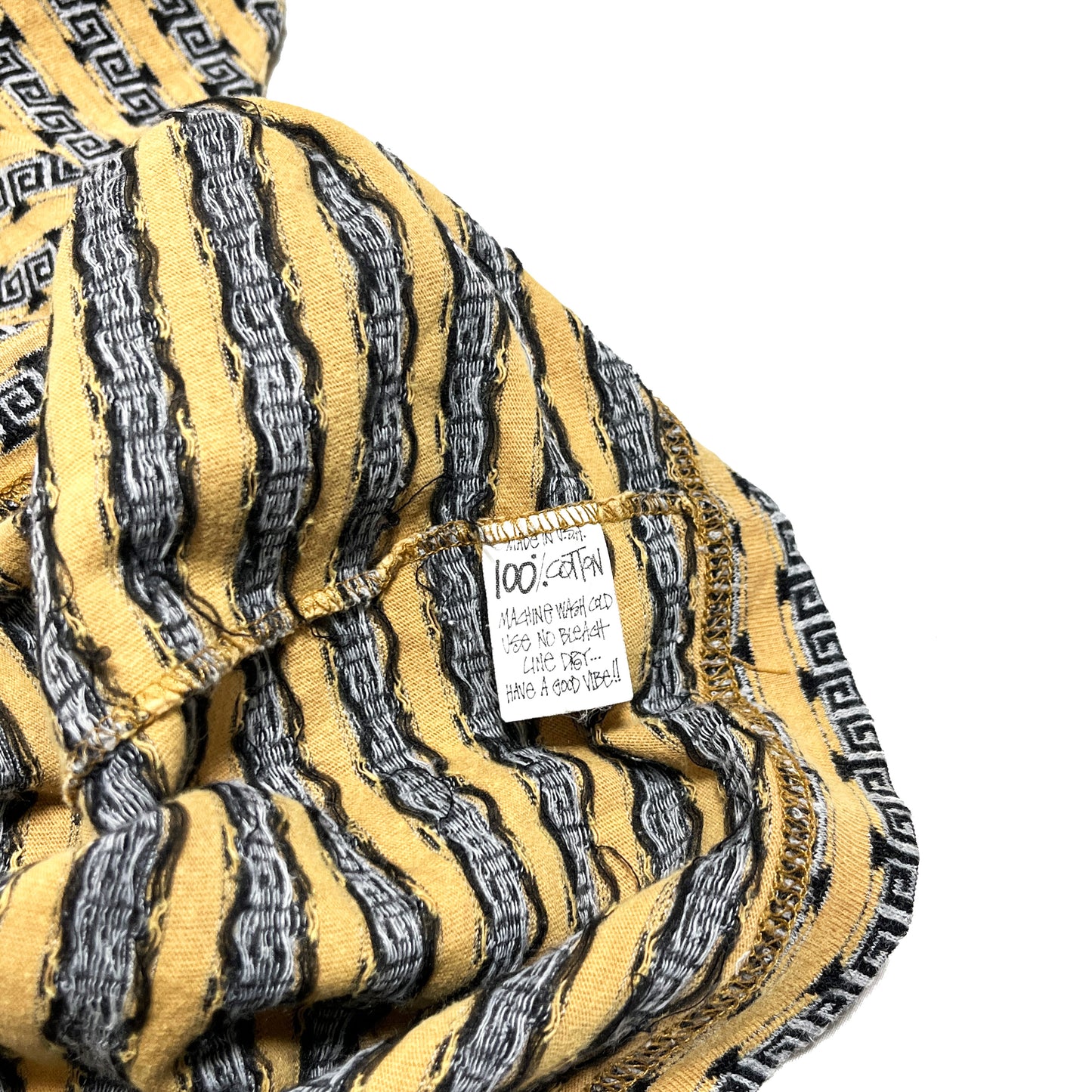 80s〜 Stussy TOM TOM Border Pocket T L ディテール 1 袖の裏面 Stussyロゴタグと黒のグリッドプリント