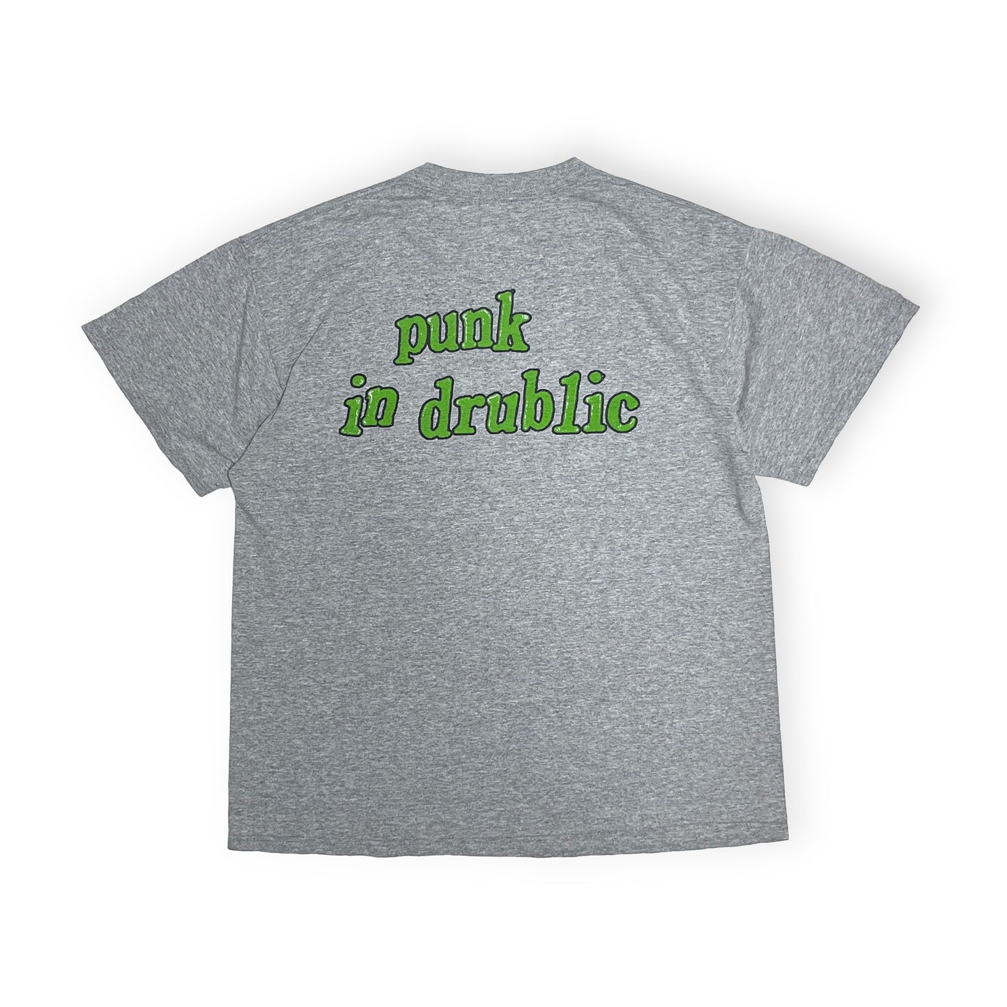 90s DELTA NOFX "Punk in Drublic" T L 背面 灰色Tシャツ背面 緑色の'punk in drublic'文